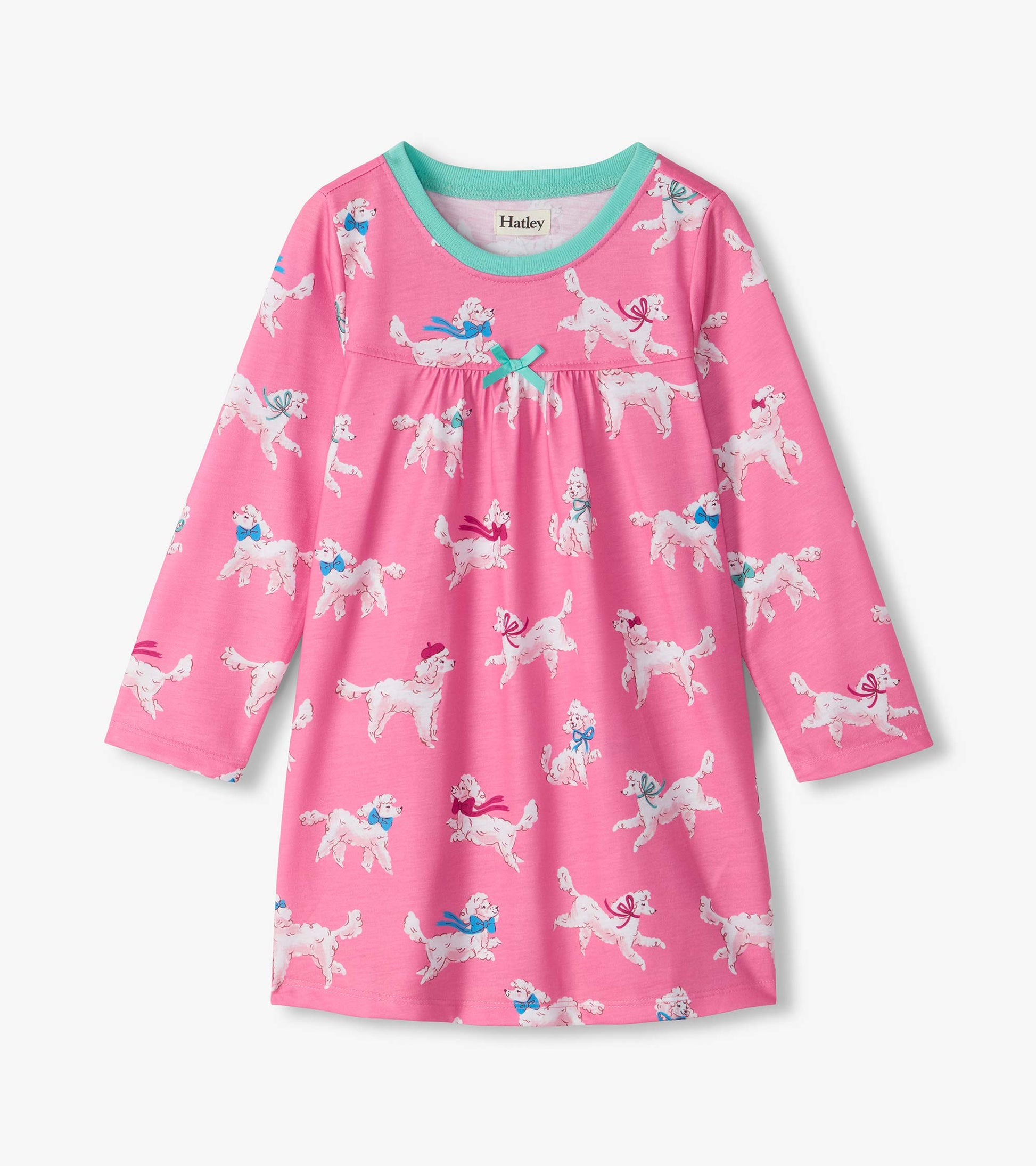 Pink long-sleeve nightdress with white poodle print, aqua neckline, and small bow at the chest