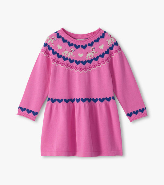Pink long-sleeve sweater dress with blue heart trim and dog motif across the chest and waist