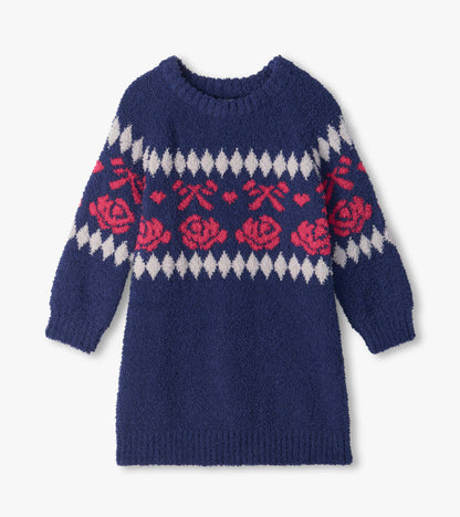 Front view of girls navy sweater dress with pink roses and bows, white diamond pattern, and long raglan sleeves