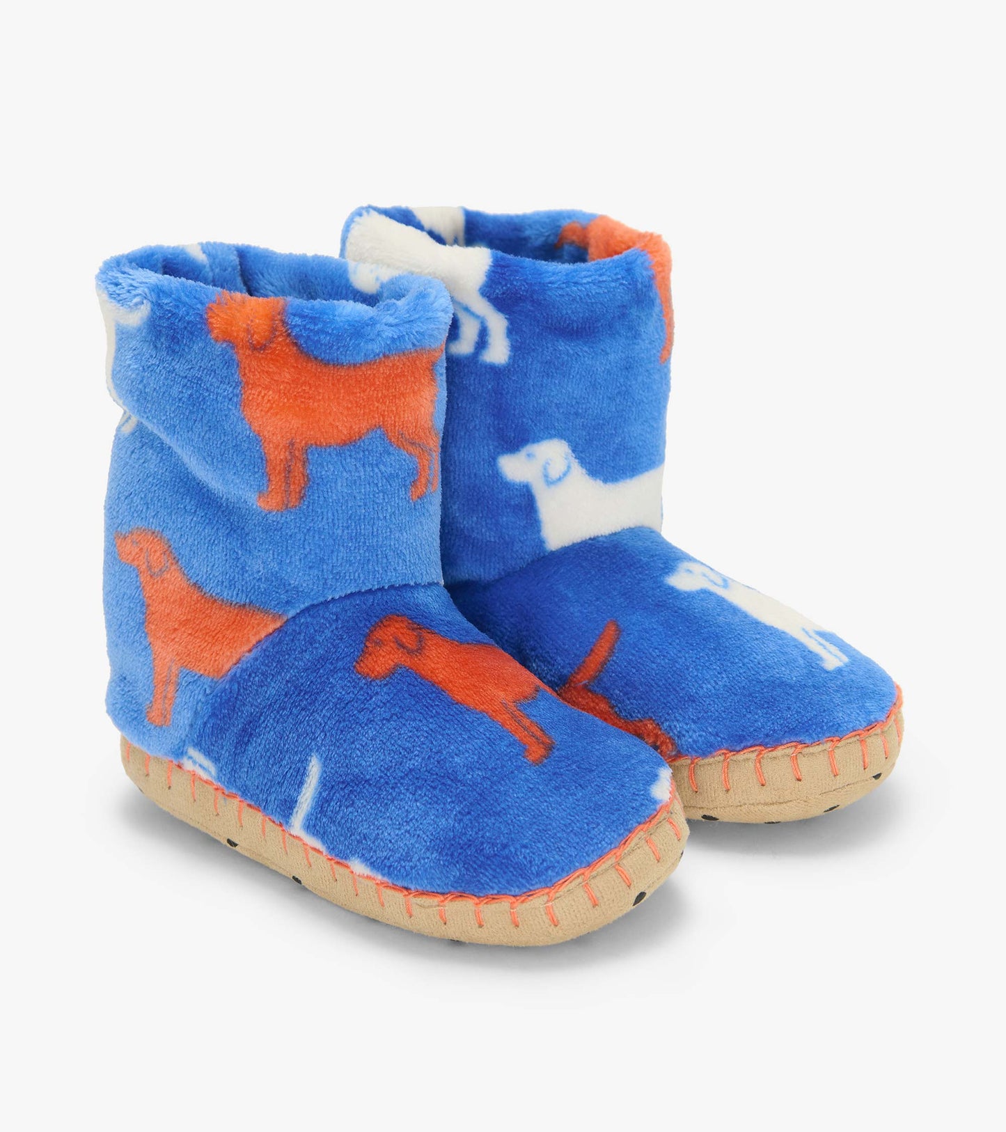 Pair of blue fleece bootie slippers with orange and white dog silhouettes and tan soles