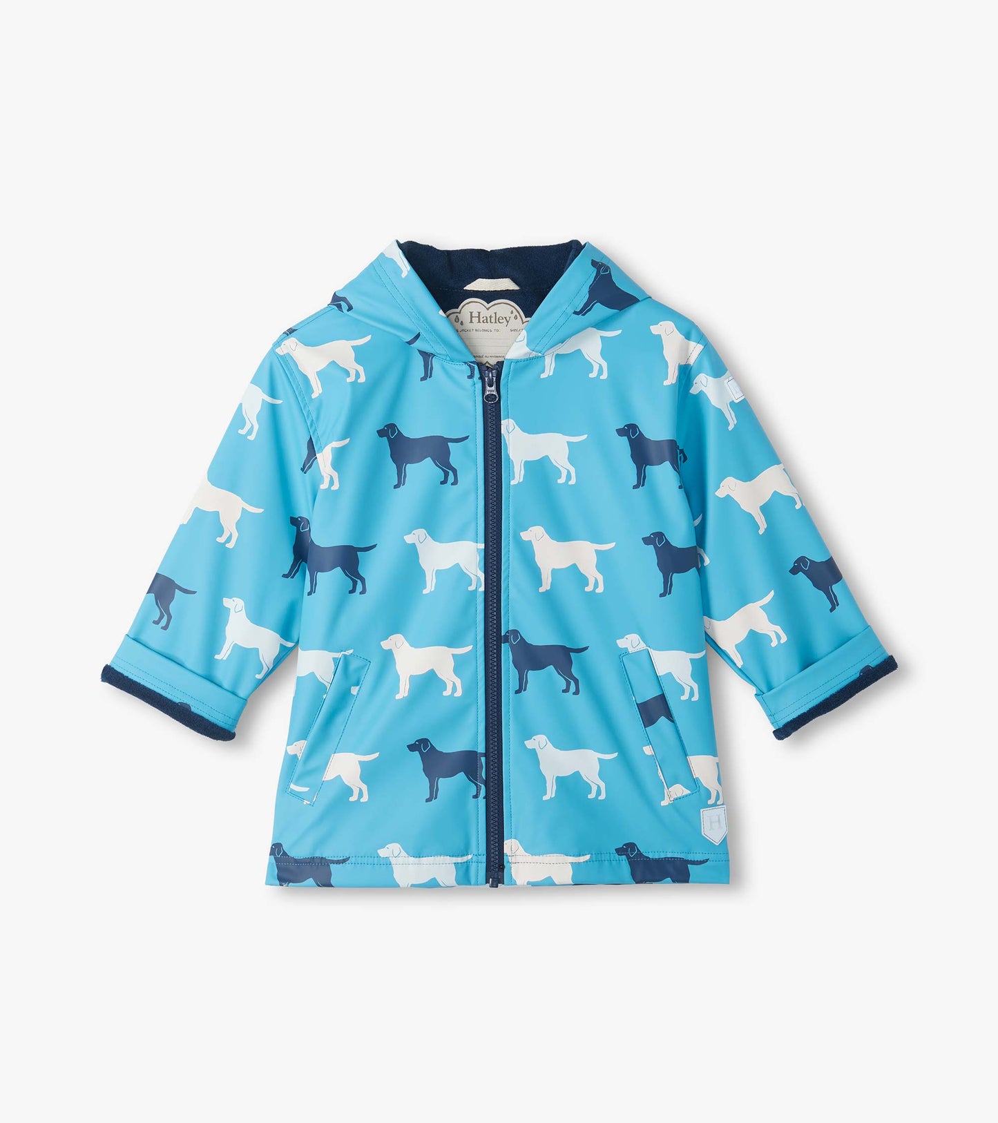 Front view of blue hooded rain coat with white and navy dog silhouettes, zip closure and front pockets