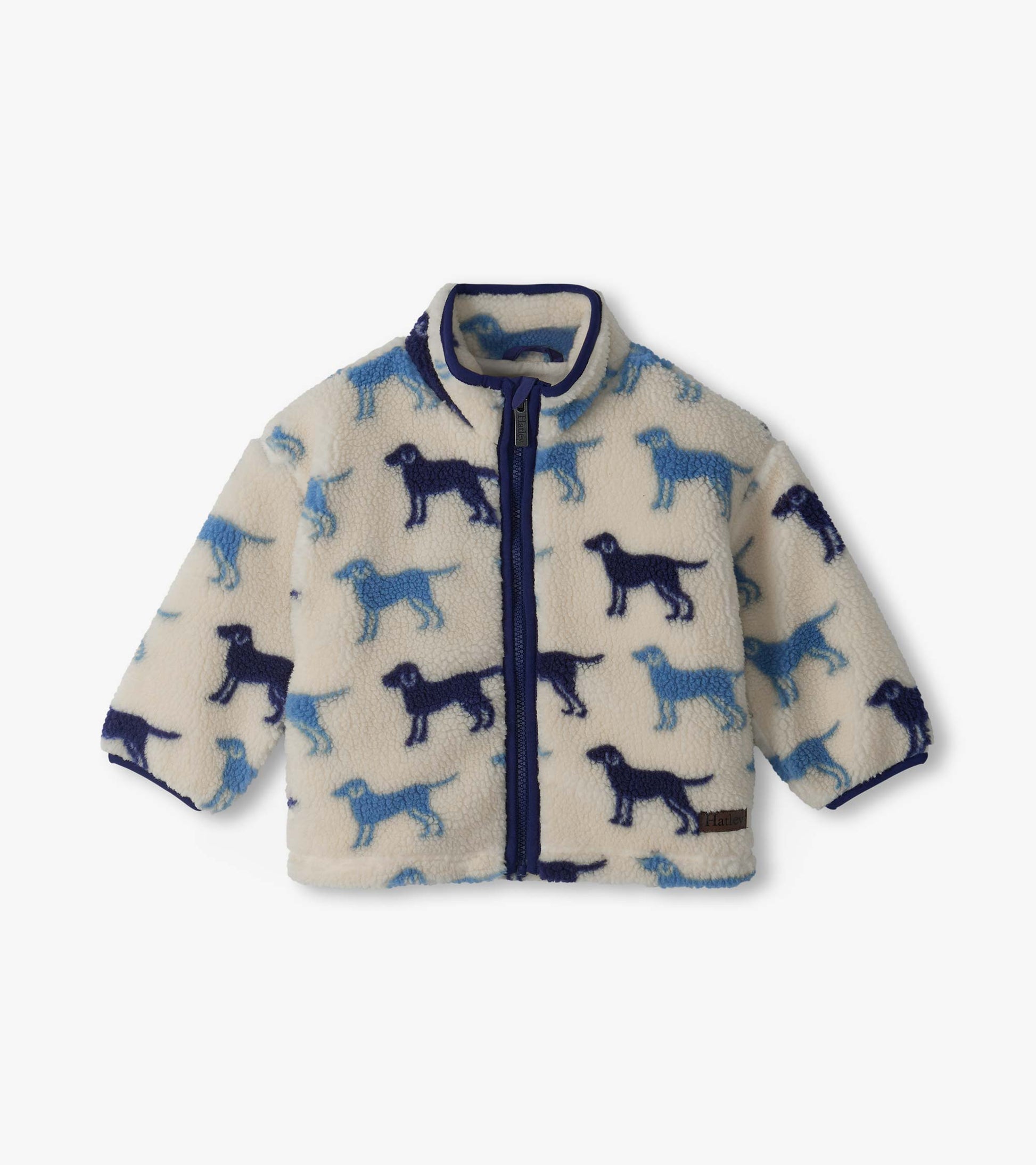 Infant mock neck zip jacket in cream with blue dog silhouettes and dark blue trim, front view