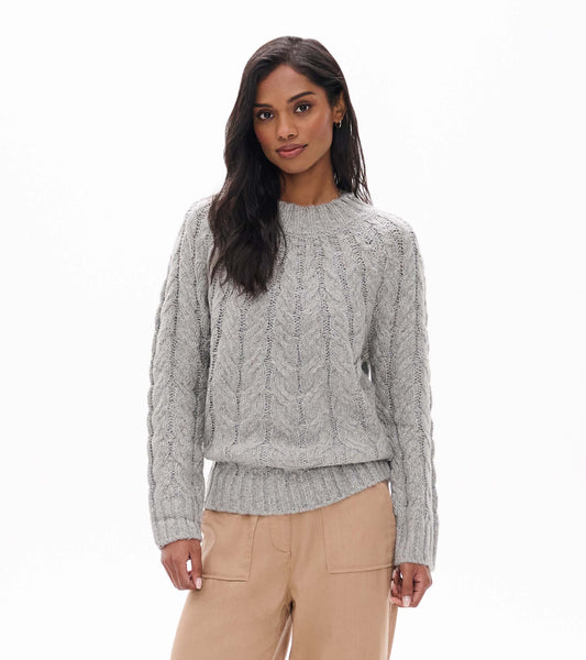 Front view of speckle grey cable-knit sweater with crew neck and ribbed hem