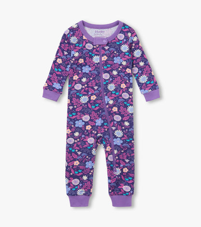 Front view of infant coverall in purple floral print with front zipper and lavender cuffs