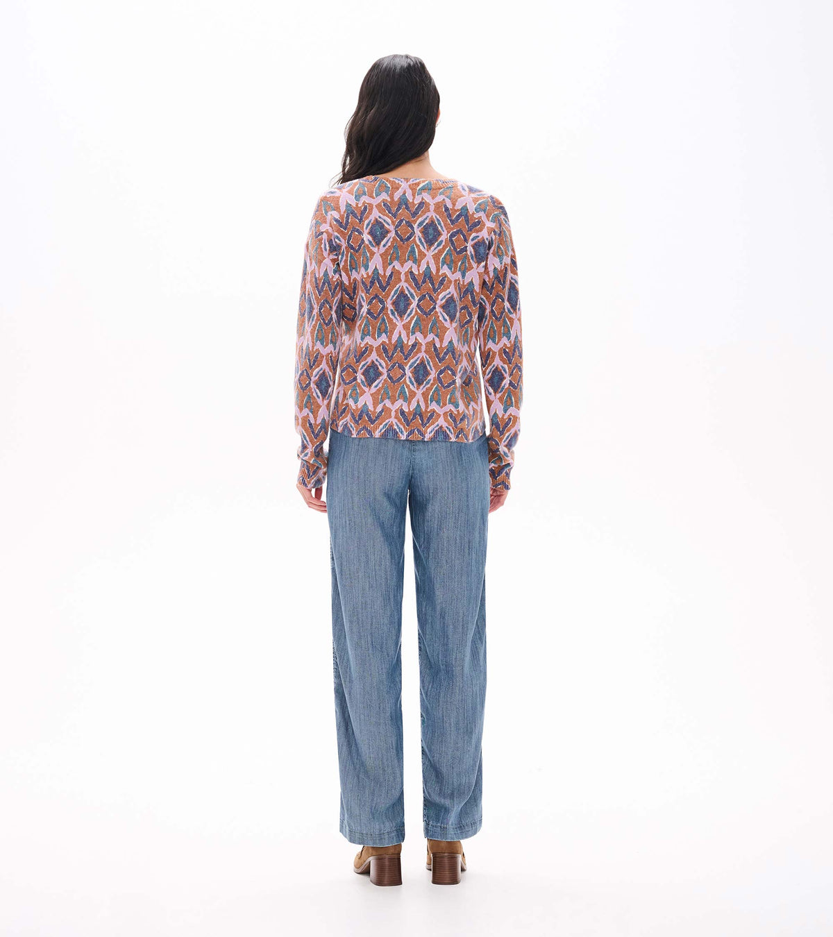 Back view of Noa sweater with allover pink, blue and rust ikat pattern