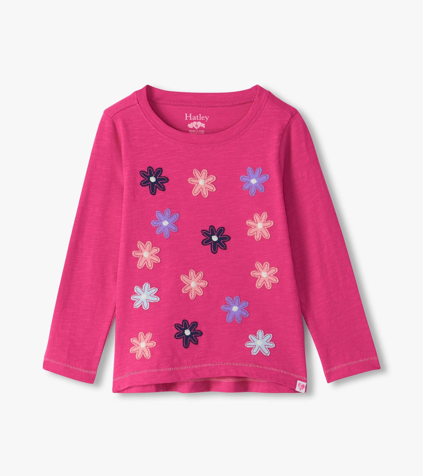 Bright pink girls long sleeve tee with multicolor flower graphics on the front