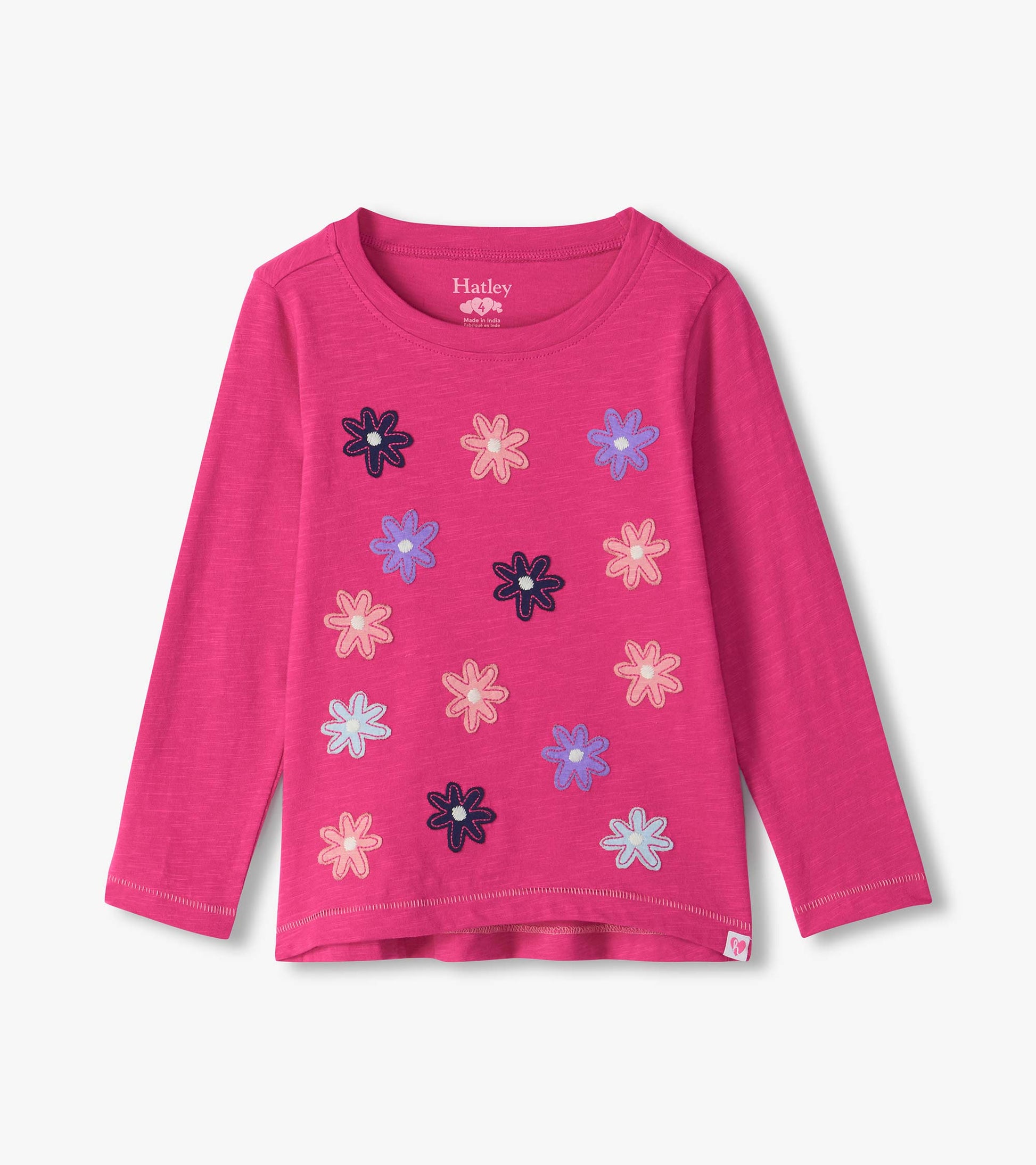 Bright pink girls long sleeve tee with multicolor flower graphics on the front