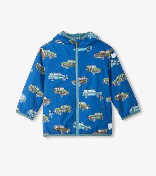 Front view of blue hooded field jacket with zipper and green, blue, and brown vintage truck print
