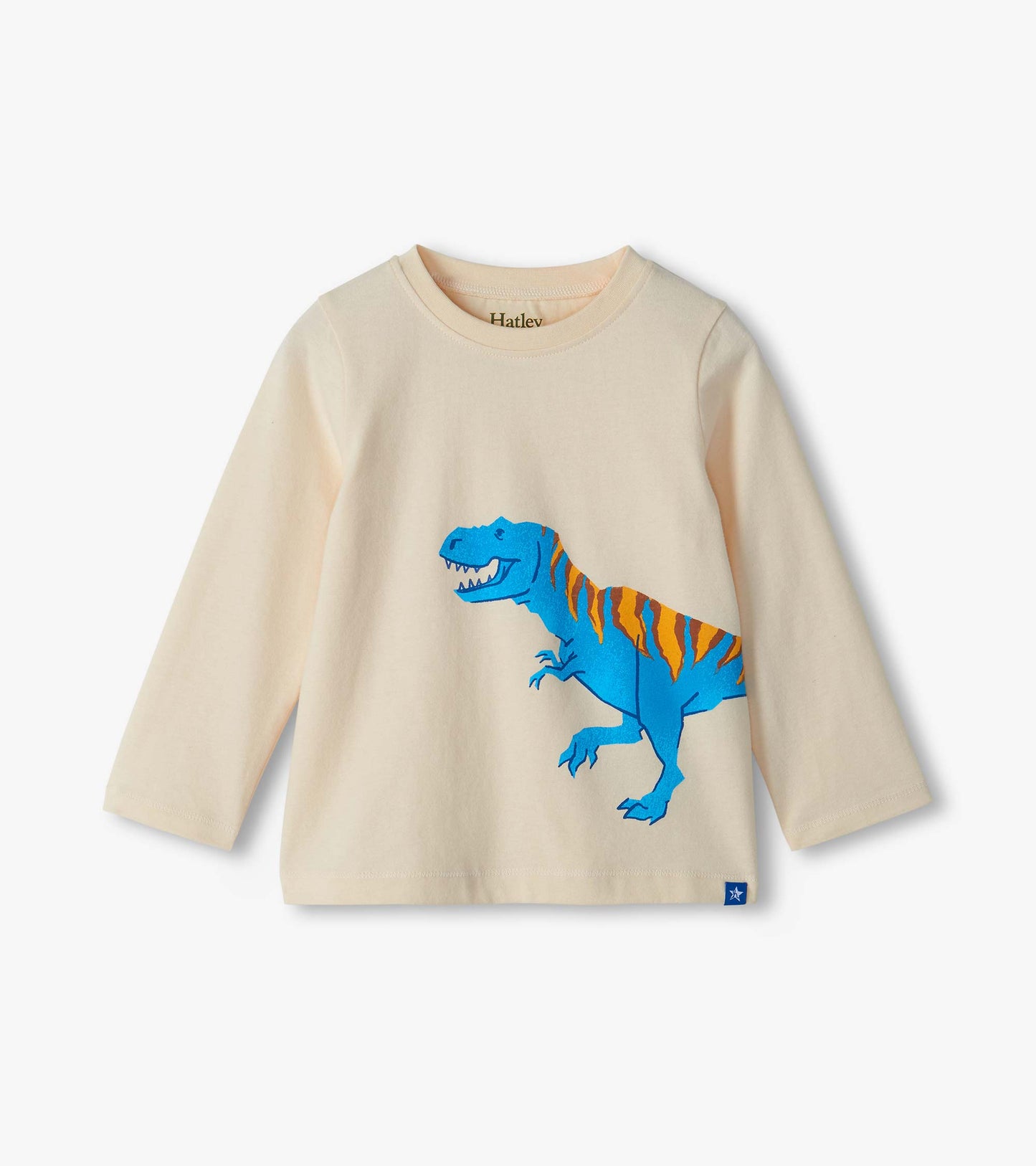 Cream long-sleeve crew neck tee with large blue T-rex graphic on the front