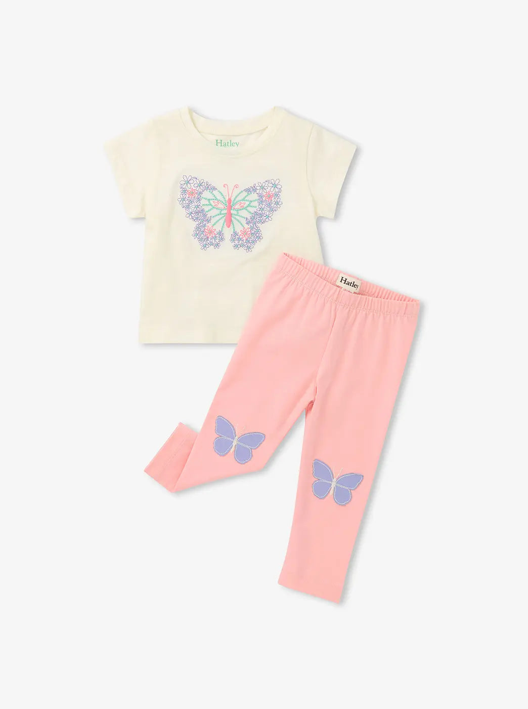 Shop baby and toddler clothing. Showing cream butterfly graphic tee with pink leggings on a white background.