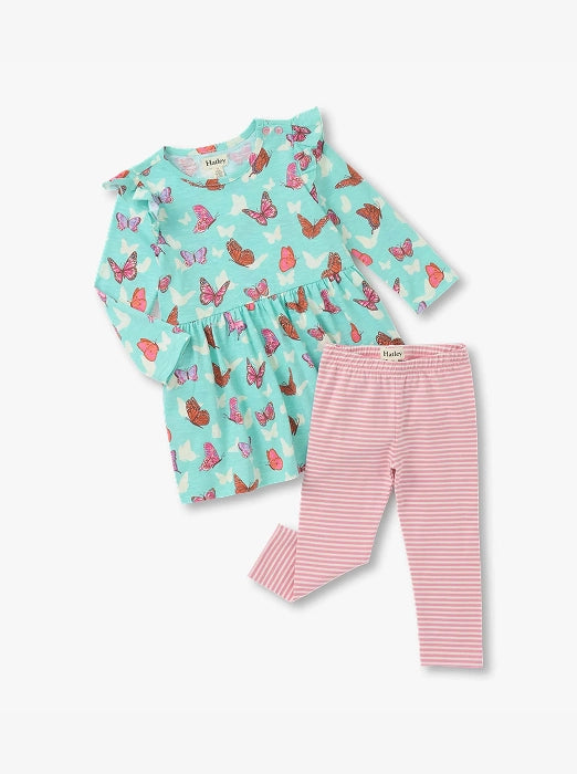 Promotes baby sale collection. Showing mint butterfly-print baby dress with pink striped leggings.