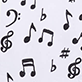 View "Here Comes Treble" Women's Cotton Pajama Pants - Black musical notes and treble clefs on a light background