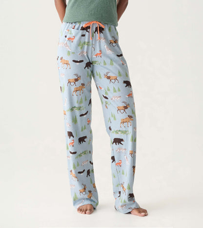 Light blue pajama pants with woodland animal and tree print, orange drawstring, straight leg, front view
