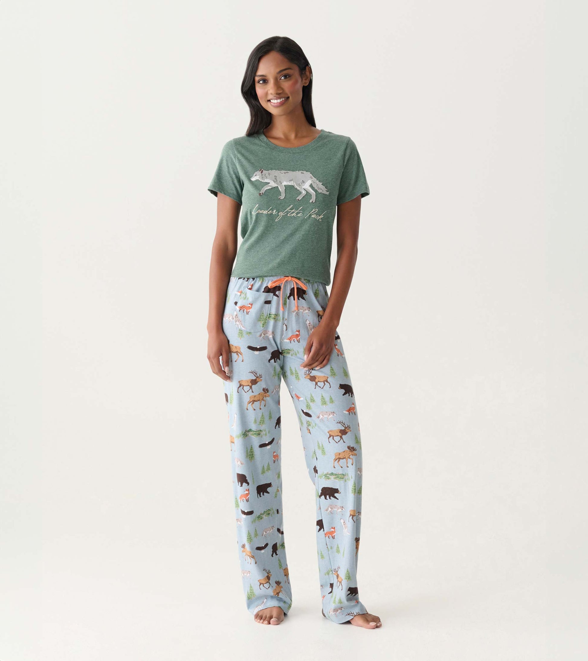 Light blue pajama pants with allover forest animal print, straight leg, shown on model front view