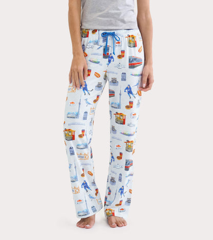 Front view of women's white pajama pants with blue drawstring and Toronto landmark print