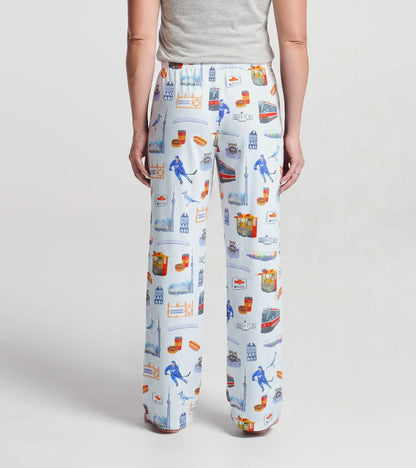 Back view of women's white pajama pants with all-over Toronto landmark and streetcar print