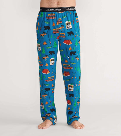 Front view of blue pajama pants with camping print and Little Blue House logo waistband