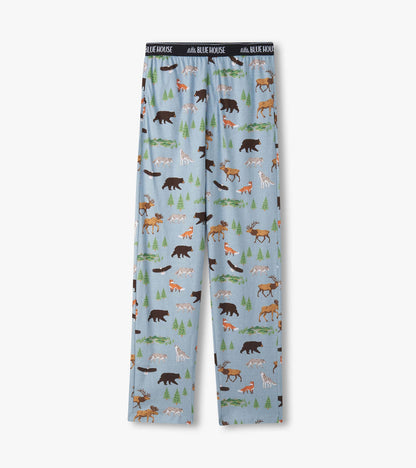 Light blue pajama pants laid flat with wilderness animal and tree print and logo waistband