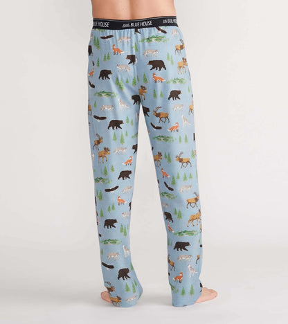 Back view of light blue pajama pants with bears, moose, foxes, wolves, trees and streams