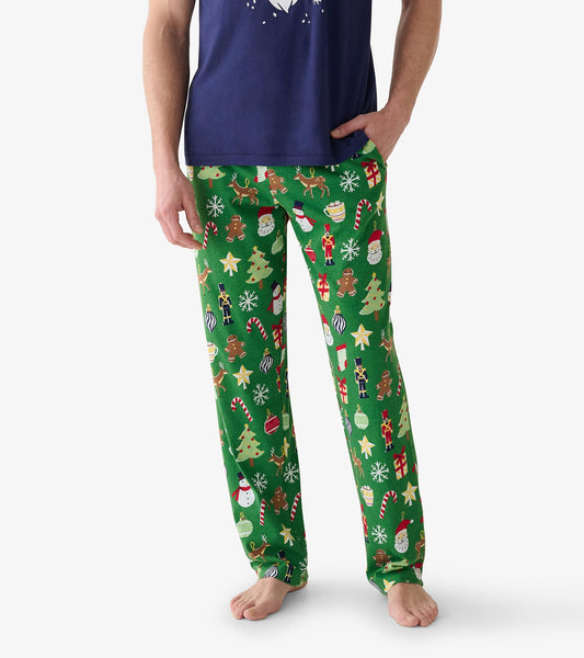 Close-up of green men's pajama pants with Christmas print and side pocket