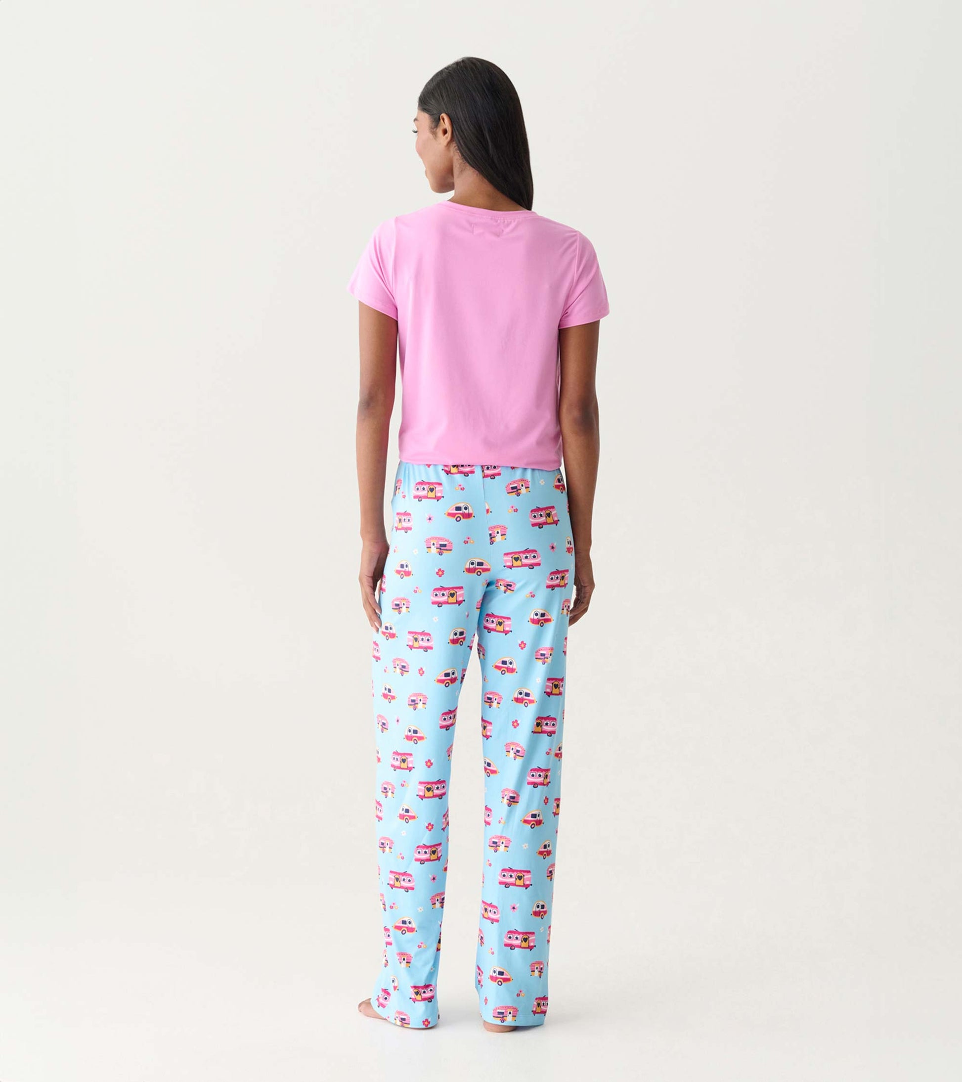 Back view of pink pajama top and light blue pajama pants with colorful camper print