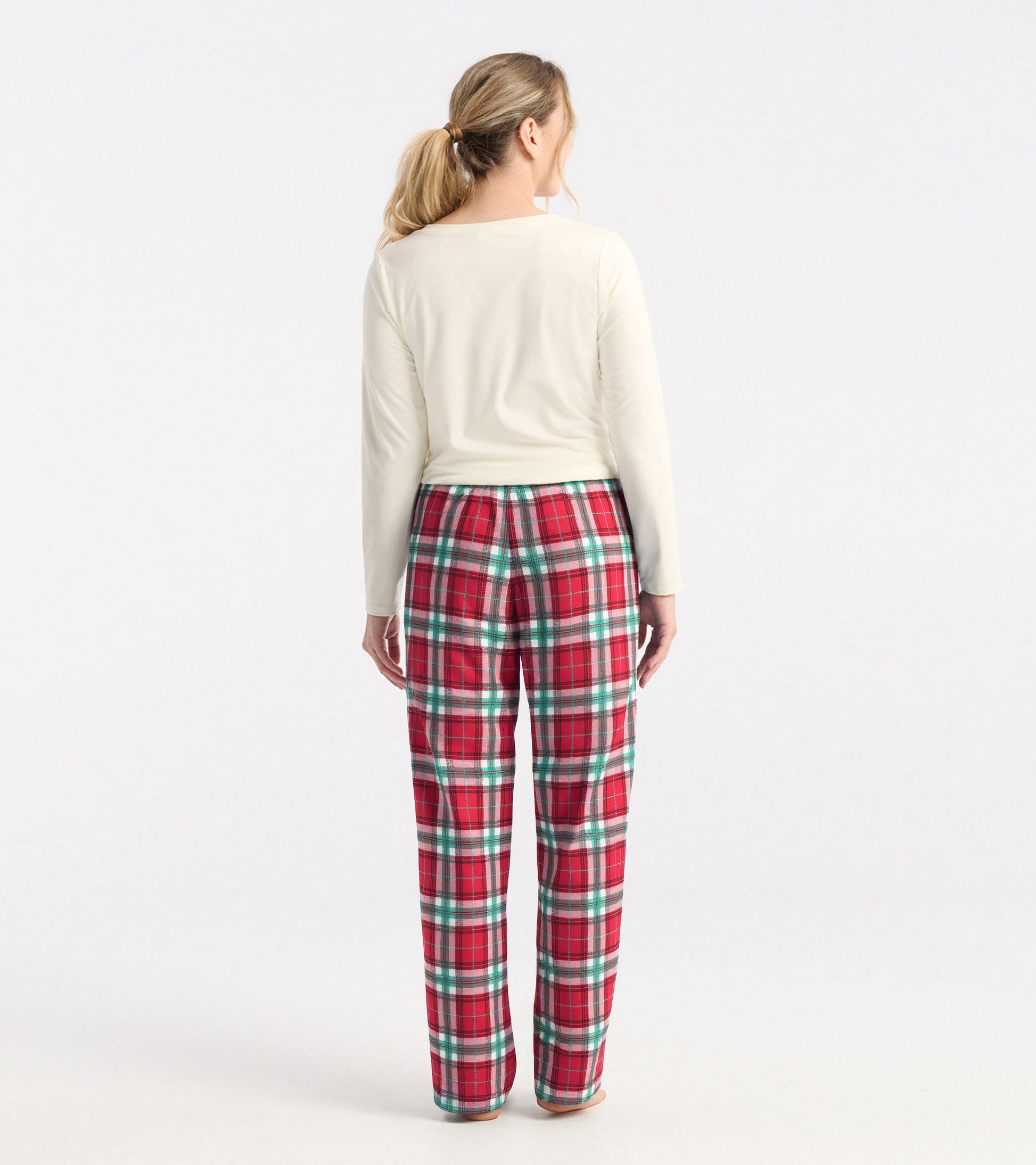 Red and green plaid polyknit pajama pants with a relaxed fit, shown from the back.
