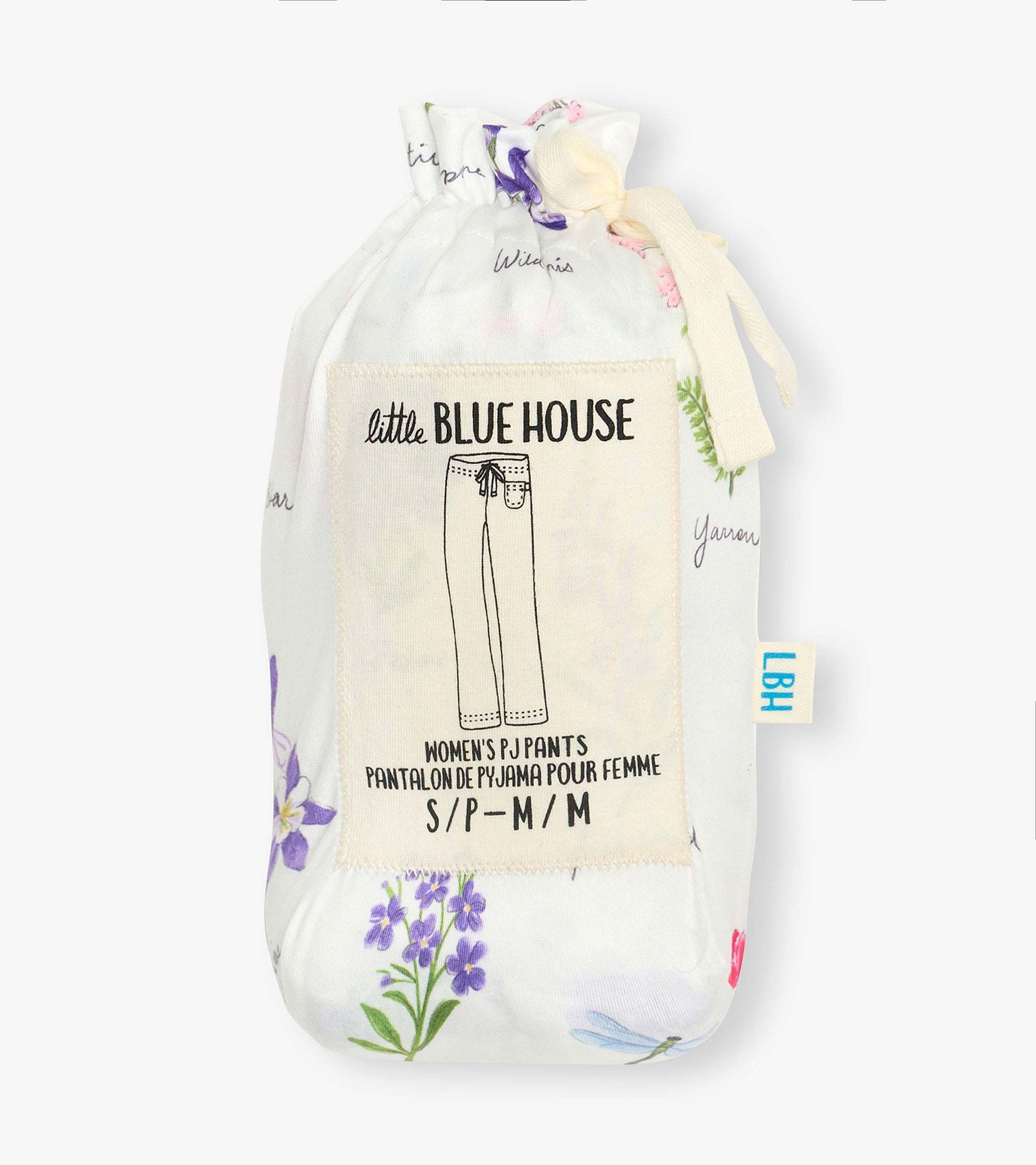 Folded white pajama pants with a colorful wildflower print and drawstring pouch packaging
