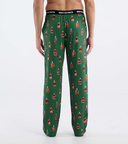 Green pajama pants with allover bourbon bottle print and black elastic waistband, back view