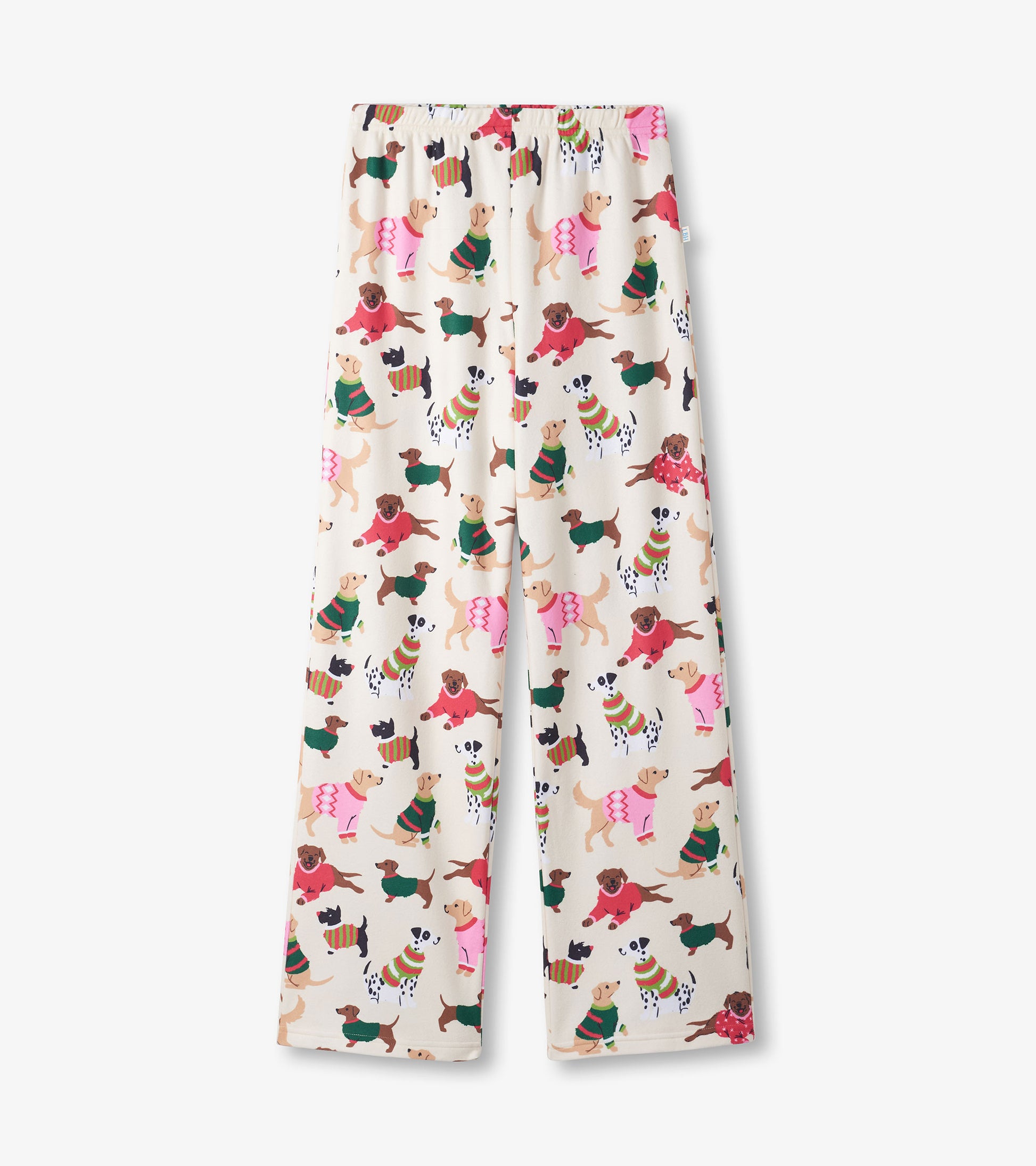 Cream-colored pants featuring a playful pattern of dogs in sweaters, designed for girls.