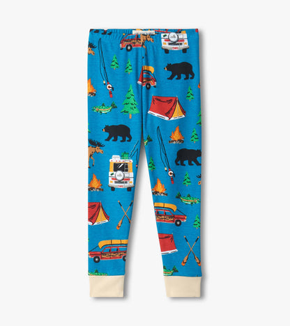Blue kids pajama pants with camping print, including tents, bears, trees, trucks, fish, and campfires.