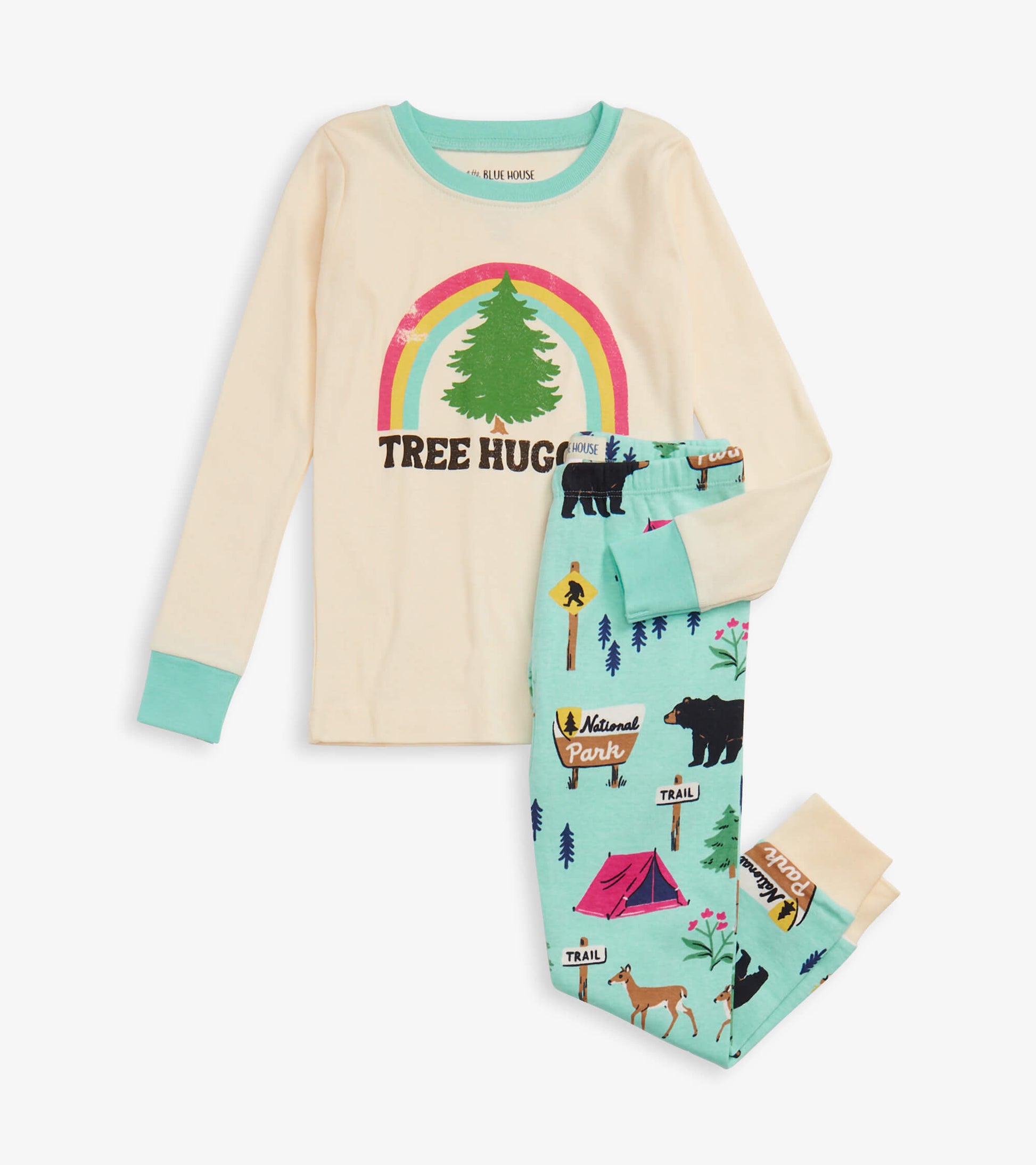 Cream long-sleeve top with "Tree Hugger" graphic and rainbow; mint green pajama pants with camping and wildlife prints.