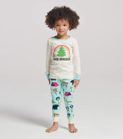 Cream long-sleeve top with "Tree Hugger" graphic, paired with aqua pajama pants featuring camping and wildlife prints.