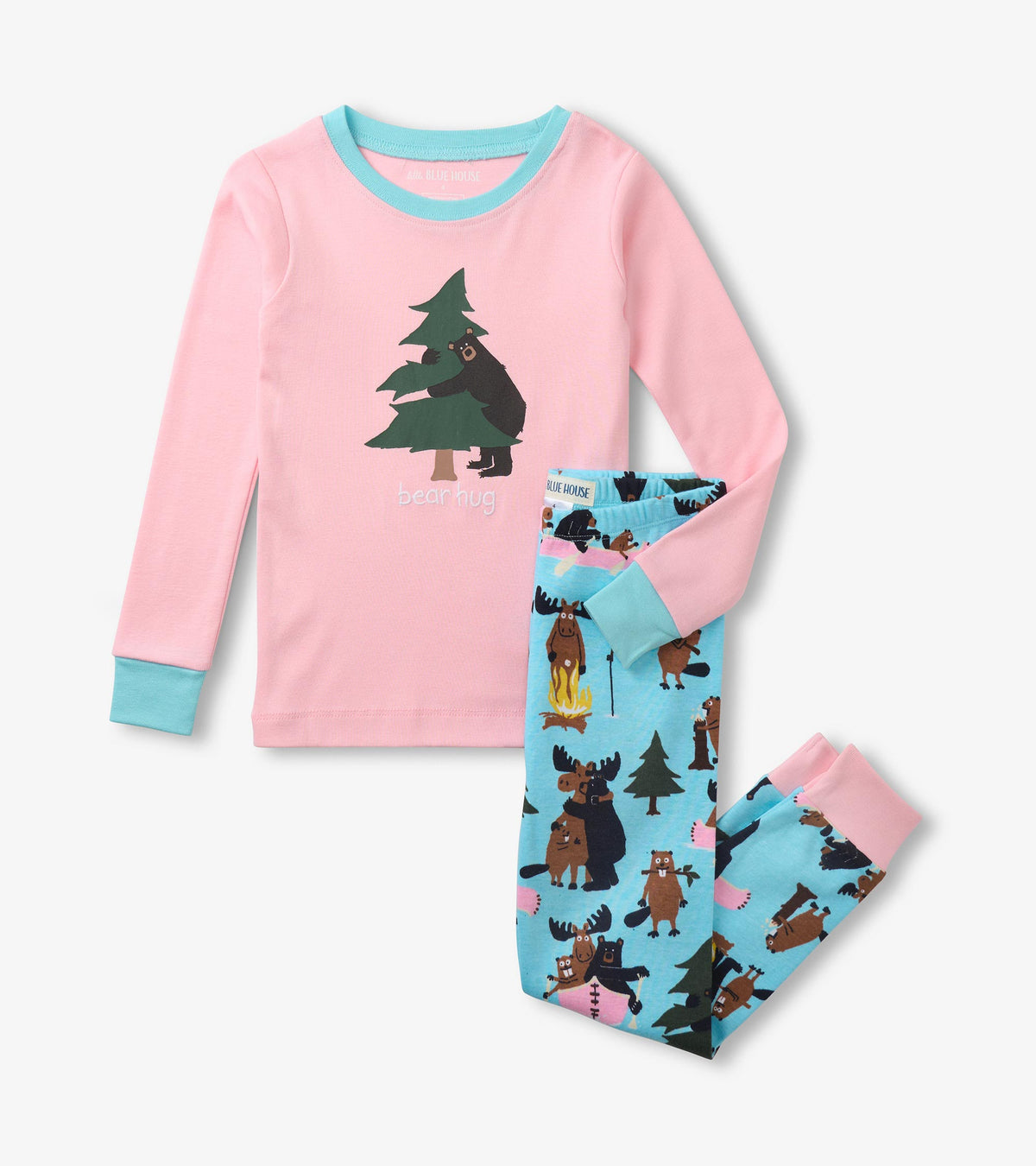 Pink kids pajama set with blue trim, bear and tree graphic top, and blue woodland print pants