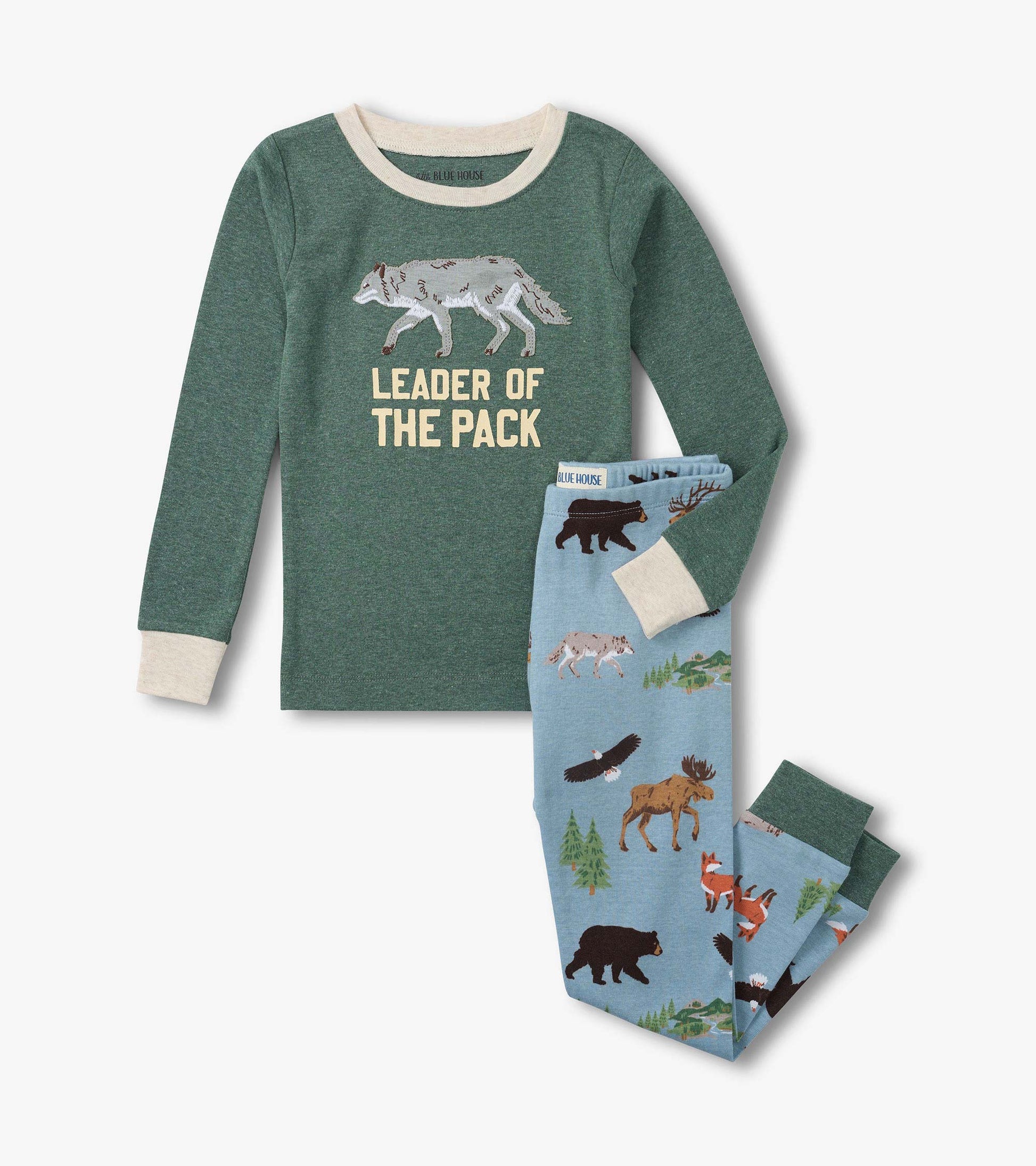 Kids green long-sleeve pajama set with wolf graphic top and blue wildlife-print pants, front view