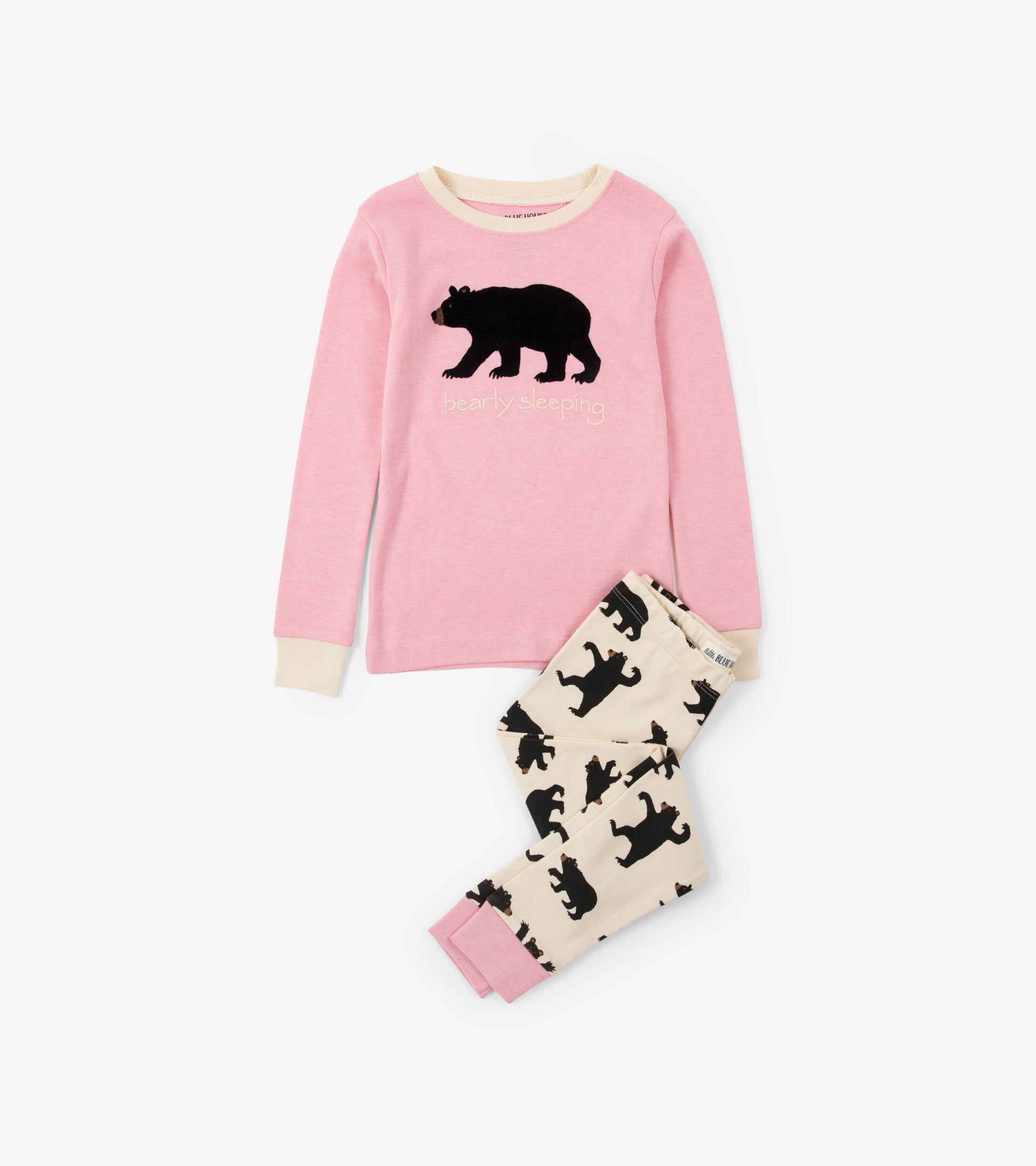 Pink long-sleeve pajama top with black bear appliqué and matching cream pants featuring black bear print.