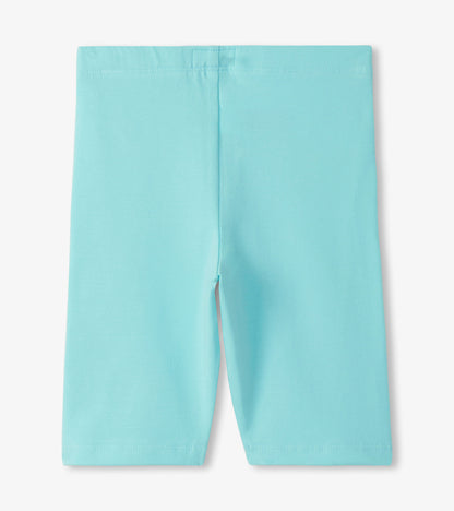 Light aqua girls bike shorts, front view, smooth stretch fabric with wide waistband and knee-length cut