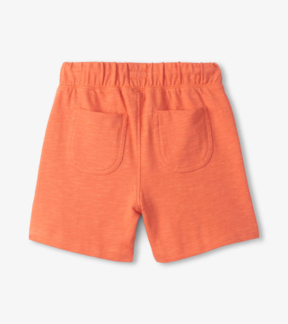 Orange boys’ shorts with elastic waistband and back patch pockets, front view