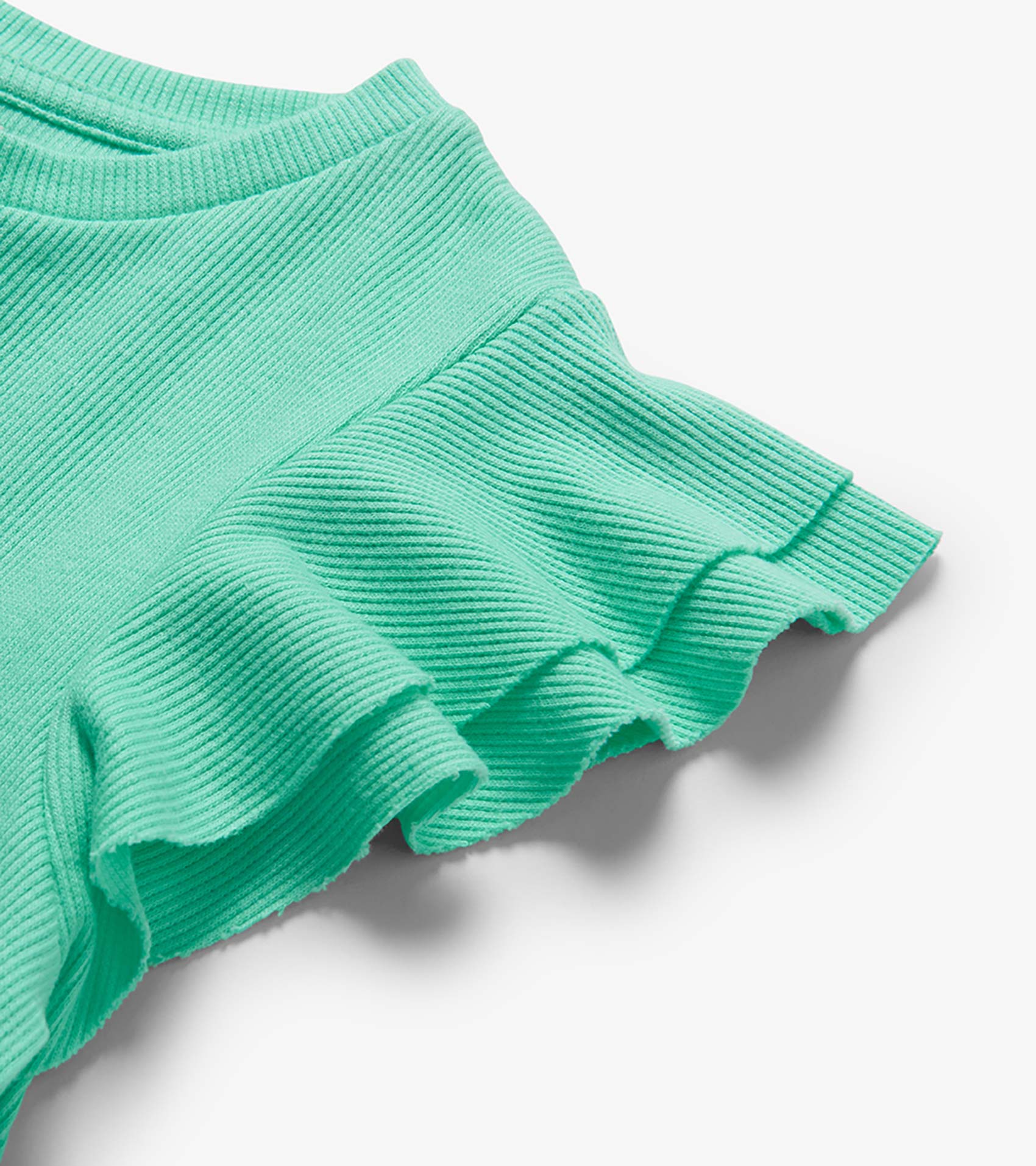 Mint green ribbed knit tank top with ruffled sleeves, close-up detail view