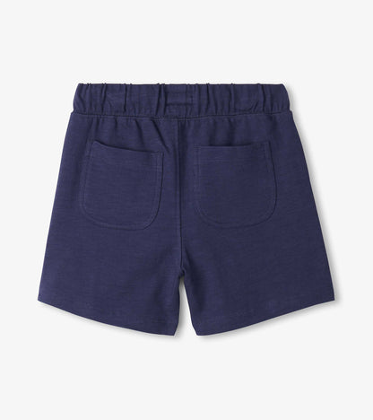 Navy blue boys' relaxed shorts with elastic waistband and back patch pockets, back view