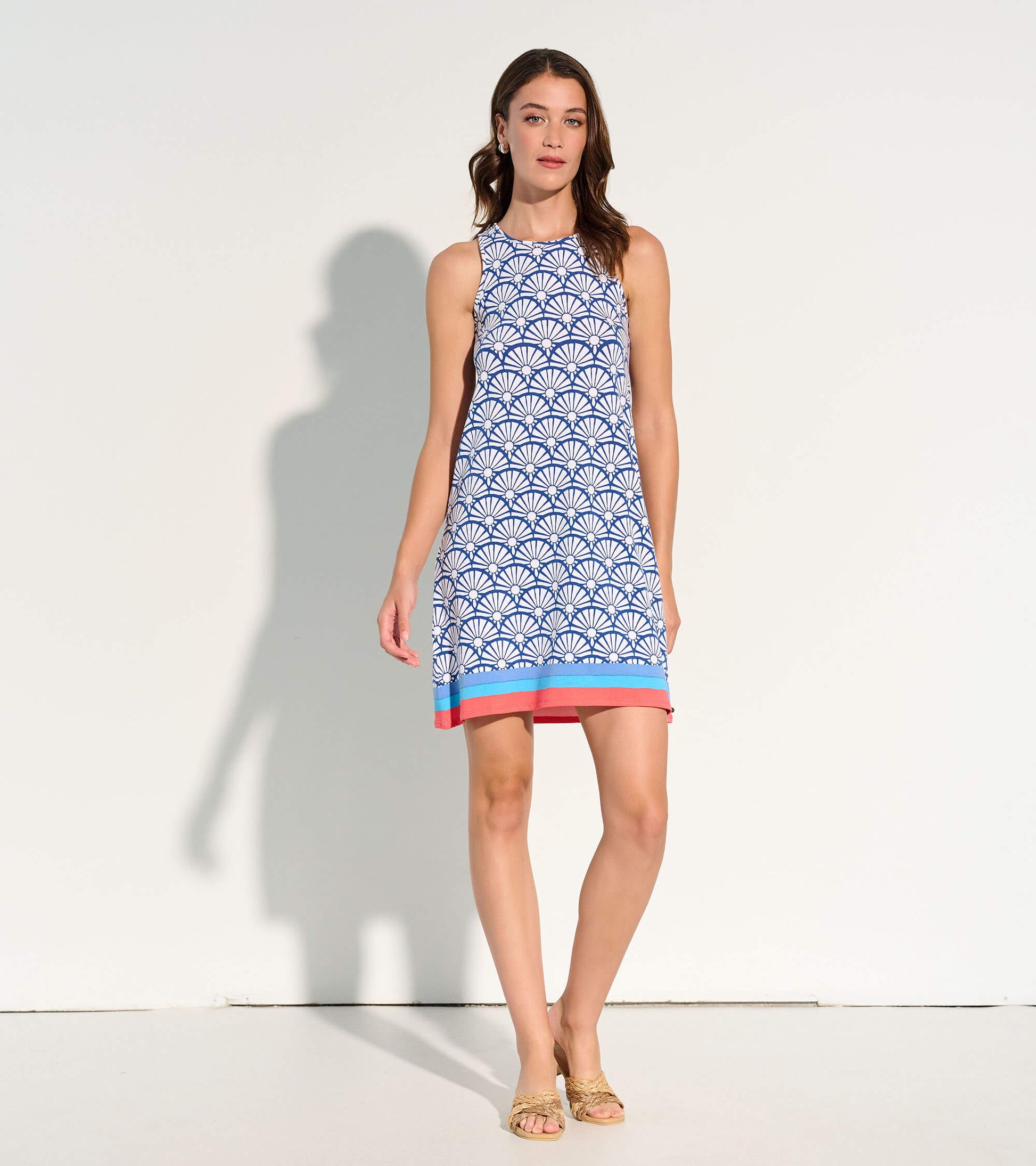 Bella sleeveless shift dress with blue and white fan print and coral blue striped hem
