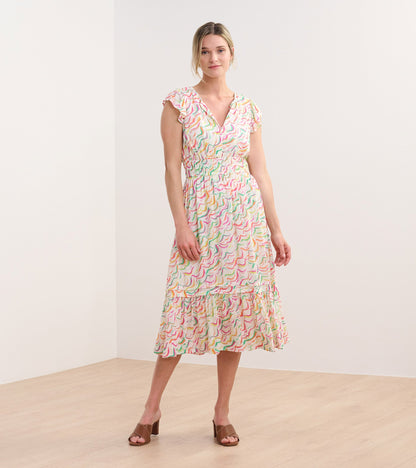 Midi dress featuring wavy stripes in pastel colors, with a smocked waist and ruffled sleeves.