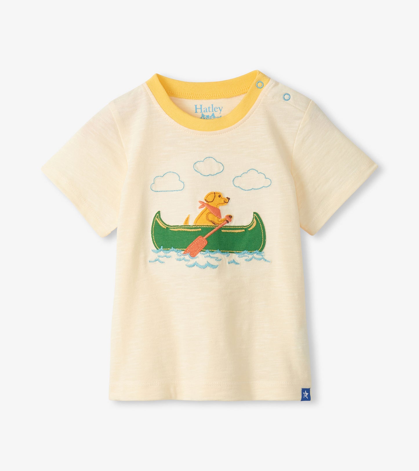 Cream short-sleeve toddler T-shirt with yellow trim and a dog canoe graphic on the front