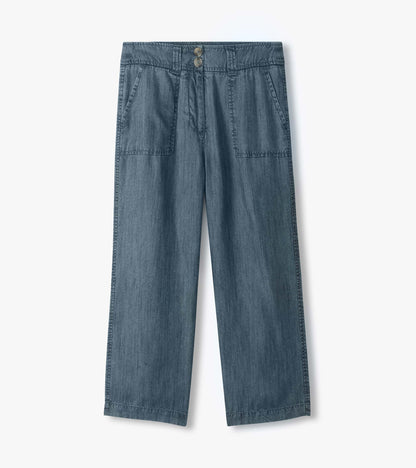 Blue wide-leg denim pants with front patch pockets and button waist, shown flat front view
