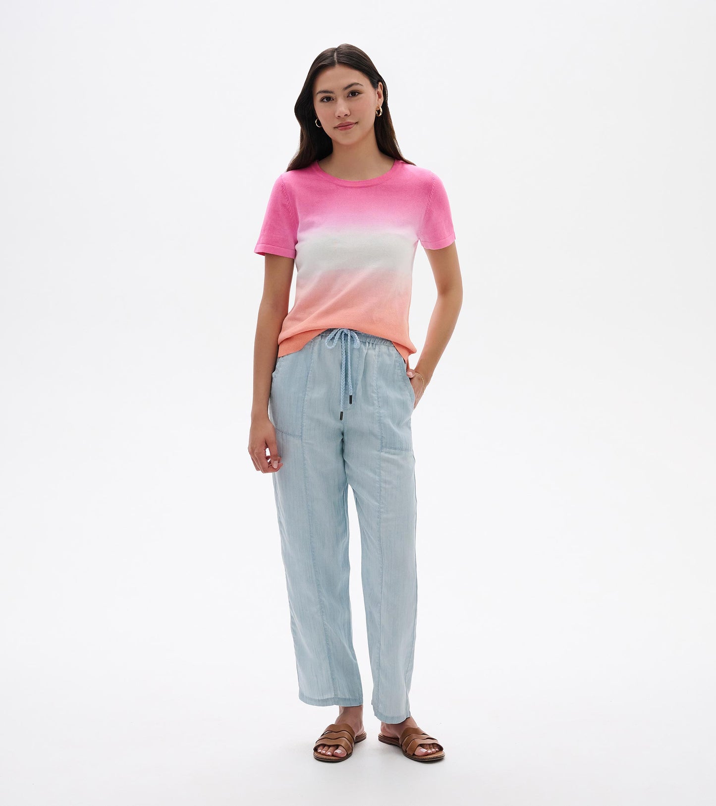 Front view of a pink-to-white-to-peach dip-dye knit tee with short sleeves and crew neck.
