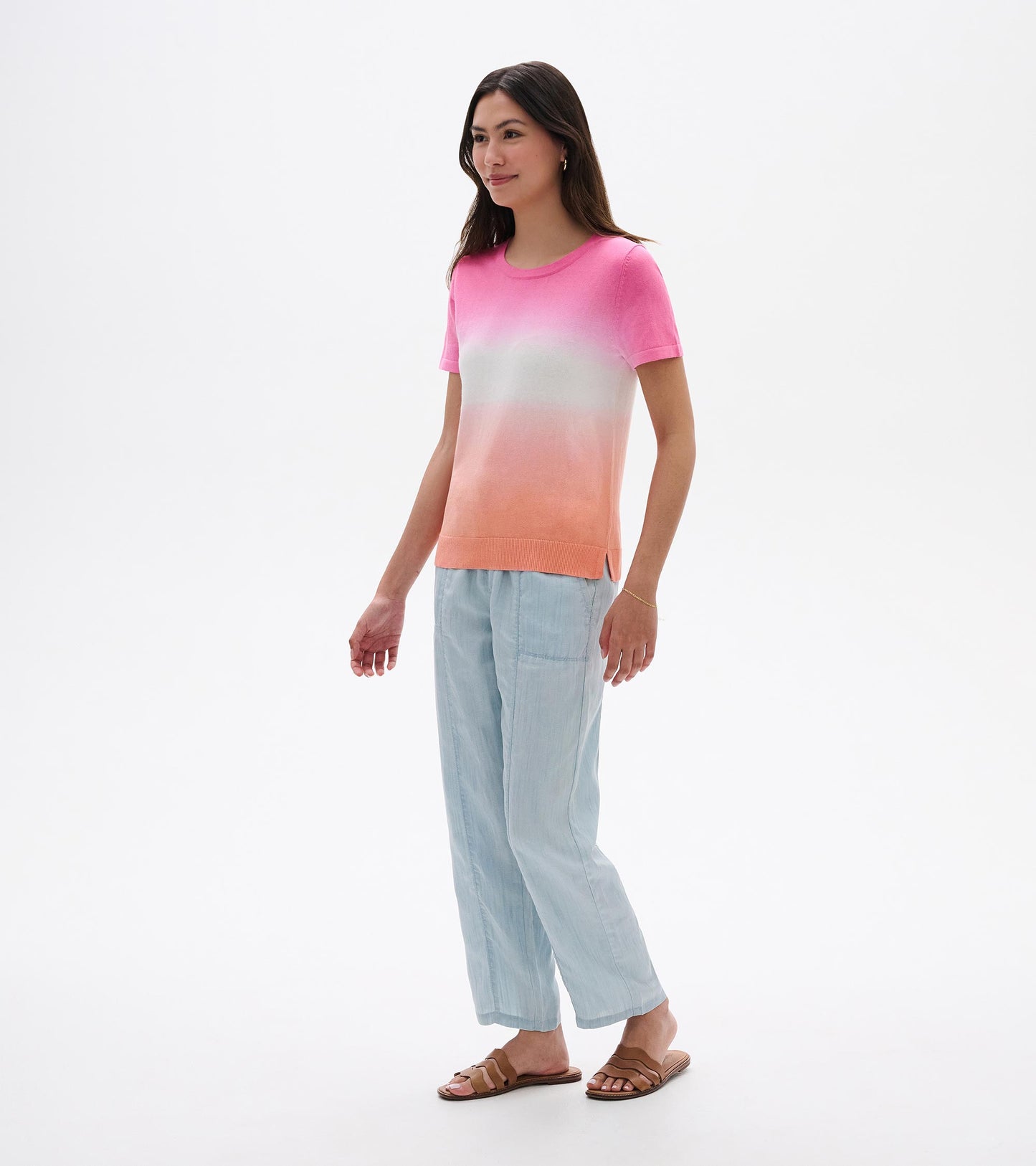 Short-sleeve knit tee with pink-to-coral dip dye and white center, shown on model front view