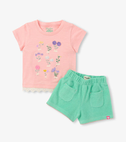 Pink floral graphic T-shirt with mint green shorts set, front view