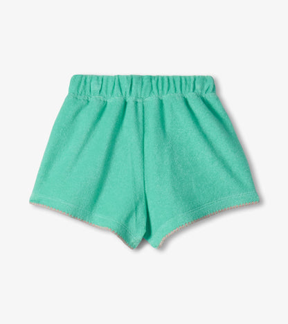 Mint green toddler shorts with elastic waistband and scalloped hem, front view