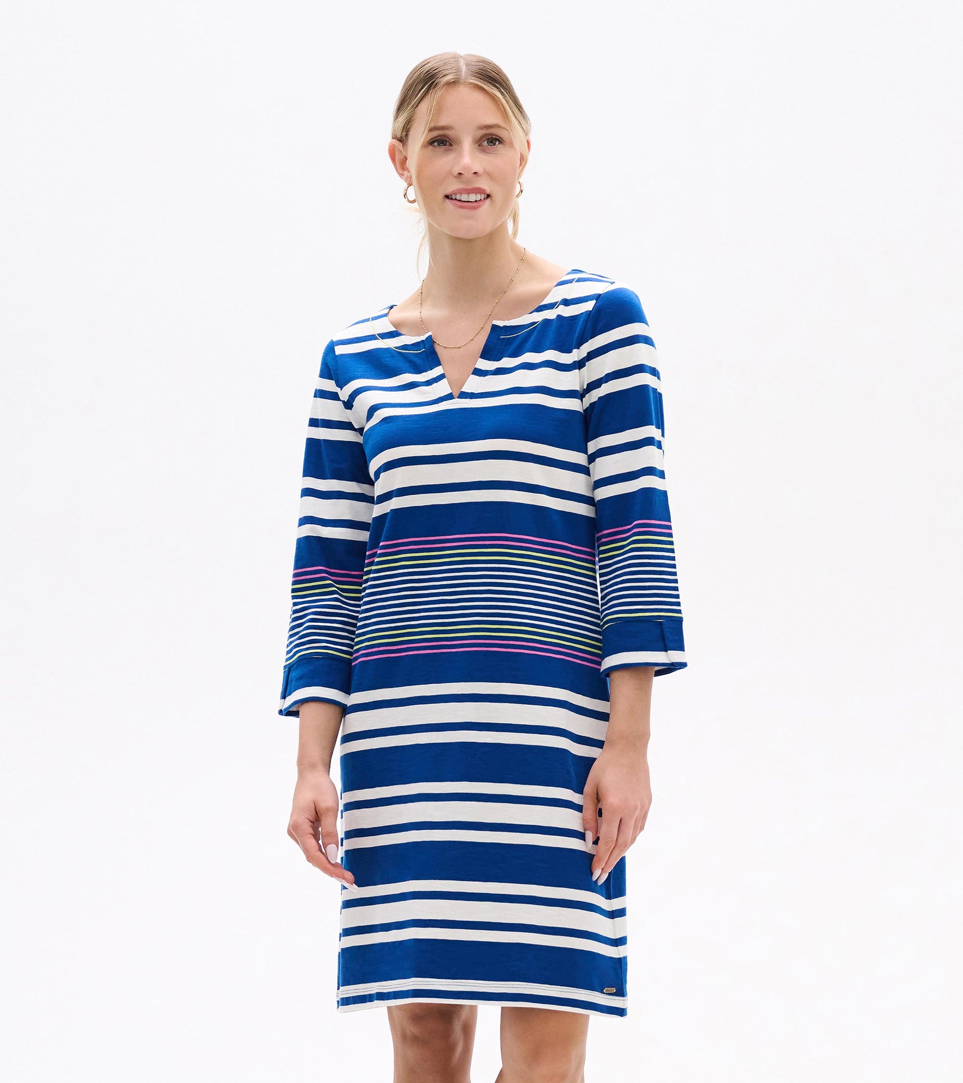 Woman wearing blue-and-white striped V-neck dress with three-quarter sleeves and multicolor stripe accents, front view