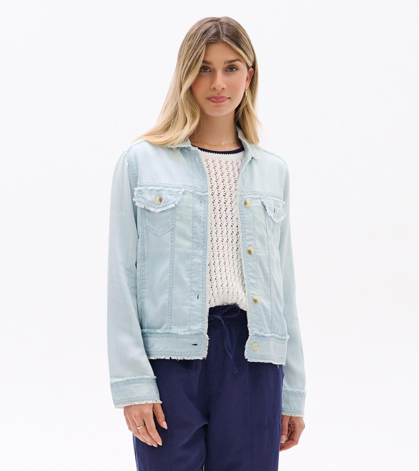 Light blue wash button-front jacket with chest pockets, shown on a model, front view