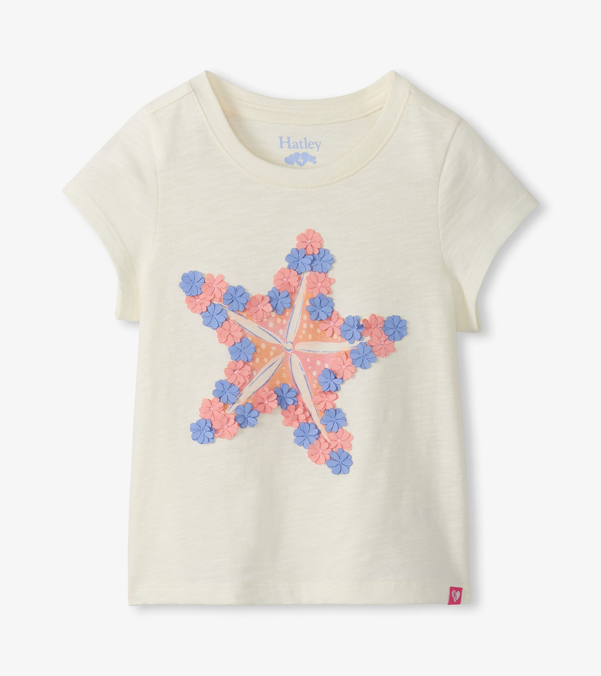 Cream short-sleeve girls tee with a large pink and blue starfish graphic on the front